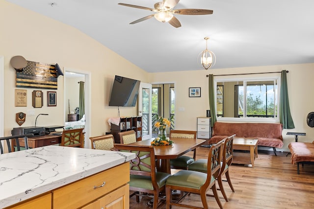16-1580 39th Ave, Kurtistown, HI 96760 - dining room with vaulted ceiling, plenty of natural light, light wood-style flooring, and a ceiling fan