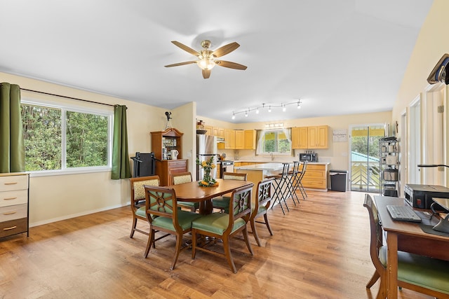16-1580 39th Ave, Kurtistown, HI 96760 - dining room featuring a ceiling fan, light wood-style flooring, and baseboards