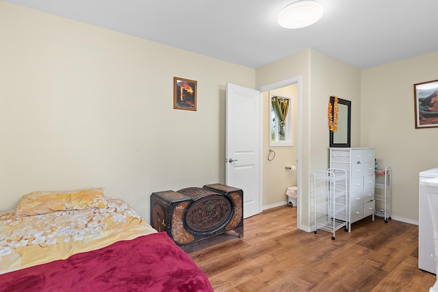 16-1580 39th Ave, Kurtistown, HI 96760 - bedroom with wood finished floors and baseboards