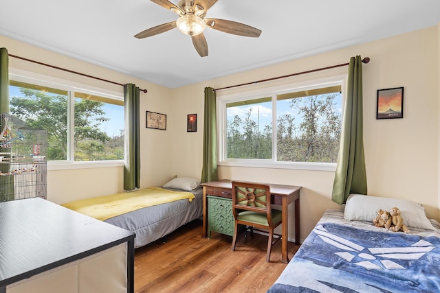 16-1580 39th Ave, Kurtistown, HI 96760 - bedroom with light wood-style flooring and a ceiling fan