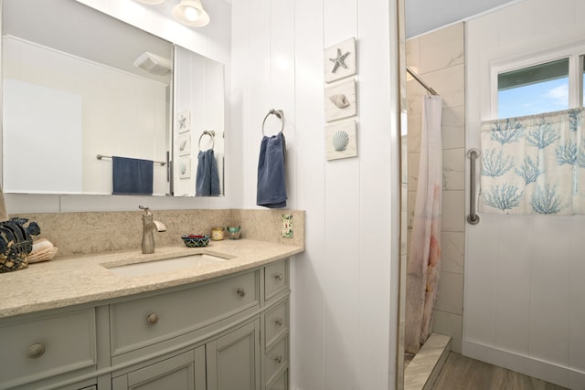 5587 Kawaihau Rd, Kapaa, HI 96746 - bathroom featuring vanity, a shower with shower curtain, and wood finished floors