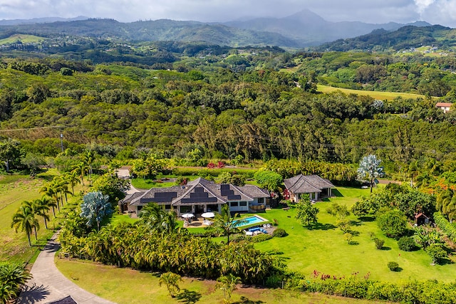 3661 Papalina Rd Unit A, Kalaheo, HI 96741 - aerial view of property and surrounding area featuring a heavily wooded area and a mountain backdrop