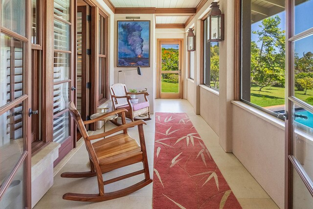 3661 Papalina Rd Unit A, Kalaheo, HI 96741 - sunroom / solarium featuring tile patterned floors and wood ceiling