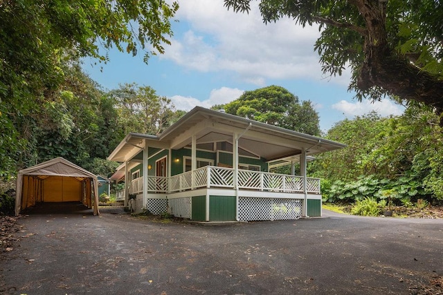 77-6105 Mamalahoa Hwy, Holualoa, HI 96725 - view of front of property with a carport, a porch, and driveway