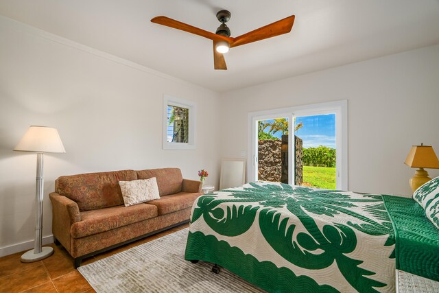 5421-C Kalalea View Dr, Anahola, HI 96703 - tiled bedroom with a ceiling fan and baseboards
