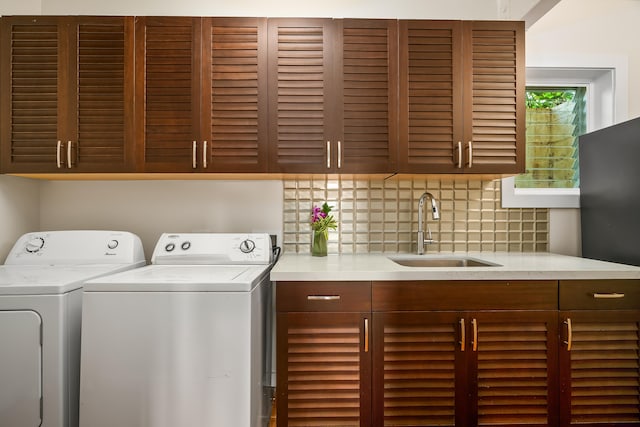 5421-C Kalalea View Dr, Anahola, HI 96703 - laundry room featuring cabinet space and washing machine and dryer