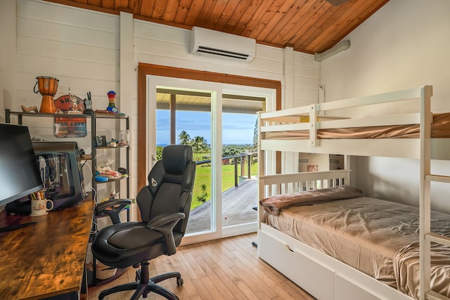 5421-C Kalalea View Dr, Anahola, HI 96703 - bedroom with an AC wall unit, access to outside, wood ceiling, light wood-type flooring, and an office area