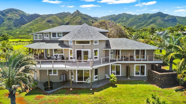 5421-C Kalalea View Dr, Anahola, HI 96703 - rear view of house with a balcony, a mountain view, a shingled roof, and a patio area