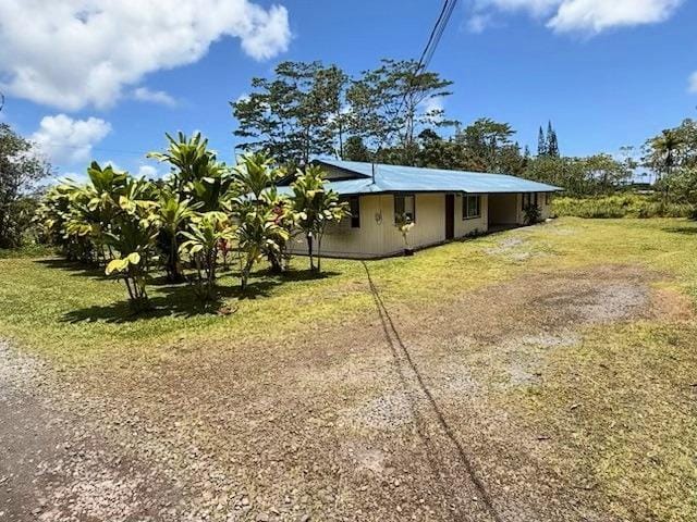 16-2007 34th Ave Unit 1 & 2, Keaau, HI 96749 - rear view of house featuring a lawn