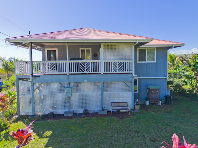 12-7042 Wehelauniu St, Pahoa, HI 96778 - back of house featuring a yard and metal roof