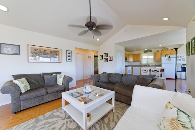 12-7042 Wehelauniu St, Pahoa, HI 96778 - living area featuring lofted ceiling, a ceiling fan, light wood-style floors, and recessed lighting