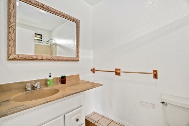 5366 Kumole St, Kapaa, HI 96746 - bathroom featuring vanity, toilet, tile patterned flooring, and a shower