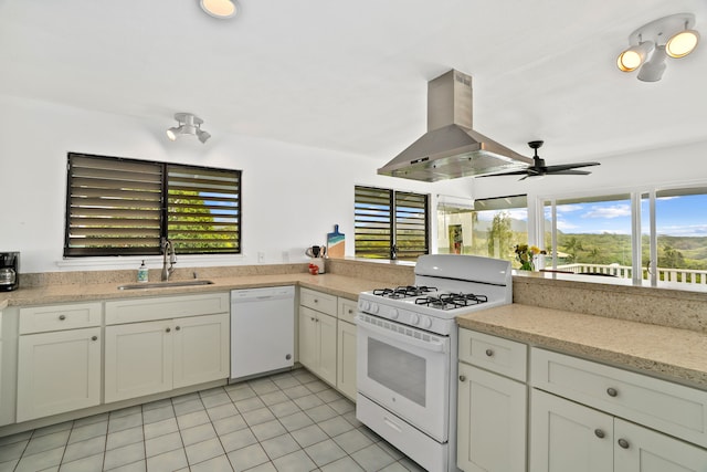 5366 Kumole St, Kapaa, HI 96746 - kitchen with white appliances, a sink, island exhaust hood, ceiling fan, and light tile patterned floors