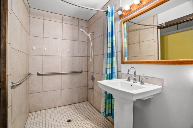 187 Lihau St, Kapaa, HI 96746 - bathroom featuring a stall shower and tile patterned flooring