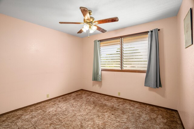 187 Lihau St, Kapaa, HI 96746 - carpeted spare room with a ceiling fan and baseboards