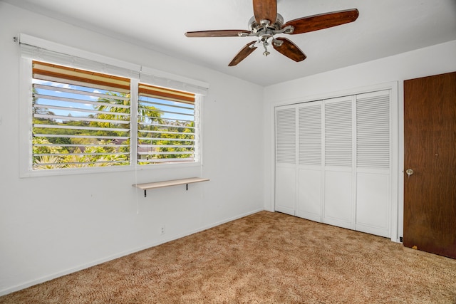 187 Lihau St, Kapaa, HI 96746 - unfurnished bedroom with carpet, a closet, a ceiling fan, and baseboards