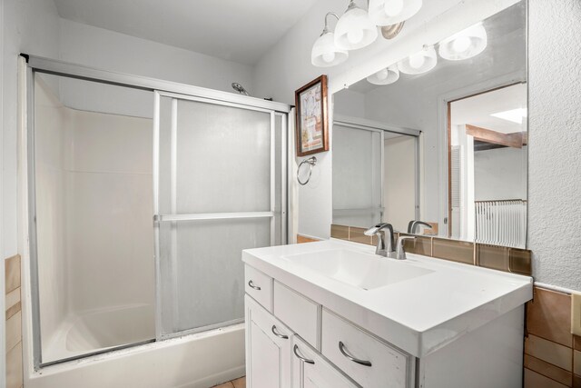 187 Lihau St, Kapaa, HI 96746 - bathroom featuring vanity and shower / bath combination with glass door