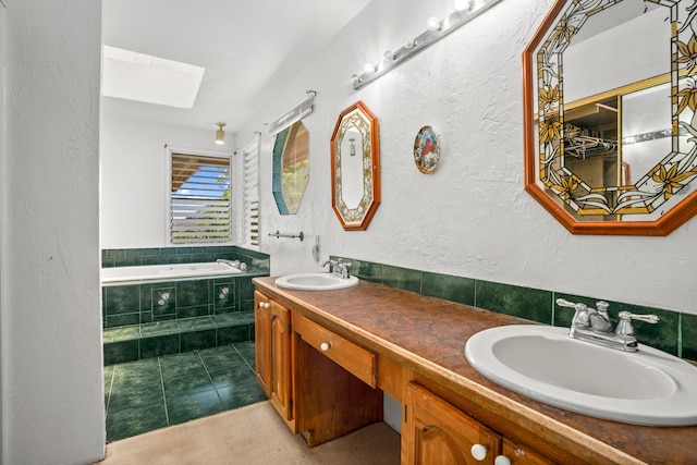 187 Lihau St, Kapaa, HI 96746 - full bath with a skylight, a bath, double vanity, tile patterned flooring, and a textured wall
