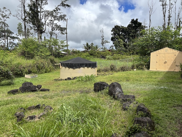 16-2157 Emerald Dr, Pahoa, HI 96778 - view of yard with a storage shed