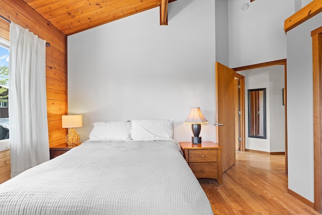 15-1644 4th Ave, Keaau, HI 96749 - bedroom featuring light wood finished floors, vaulted ceiling, wood ceiling, and baseboards