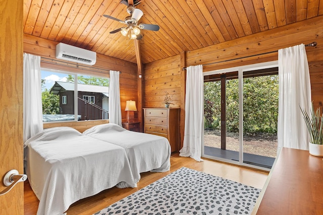 15-1644 4th Ave, Keaau, HI 96749 - bedroom with a wall mounted air conditioner, access to outside, wood ceiling, wood walls, and wood finished floors