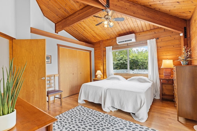 15-1644 4th Ave, Keaau, HI 96749 - bedroom with a wall unit AC, light wood-style floors, wooden ceiling, a closet, and wood walls