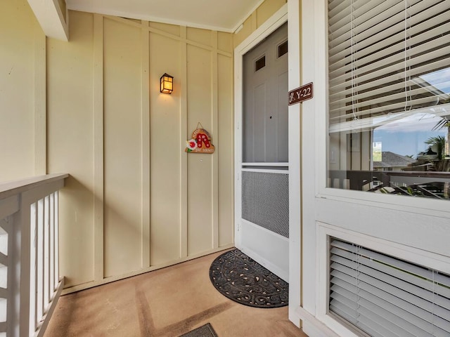 75-6009 Alii Dr Unit Y22, Kailua-Kona, HI 96740 - property entrance featuring board and batten siding