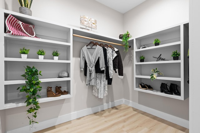 15-2026 20th Ave, Keaau, HI 96749 - spacious closet featuring wood finished floors