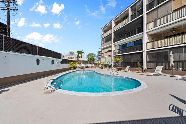 75-5719 Alii Dr Unit 307, Kailua-Kona, HI 96740 - community pool featuring a patio area