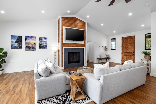 71-1871 Puu Lani Loop, Kailua-Kona, HI 96740 - living area with vaulted ceiling, a ceiling fan, a fireplace, wood finished floors, and recessed lighting