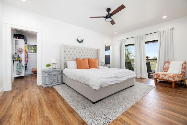 71-1871 Puu Lani Loop, Kailua-Kona, HI 96740 - bedroom with access to exterior, multiple windows, wood finished floors, recessed lighting, and a ceiling fan