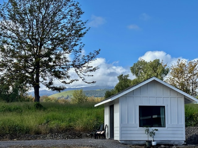 71-1871 Puu Lani Loop, Kailua-Kona, HI 96740 - view of side of property with board and batten siding