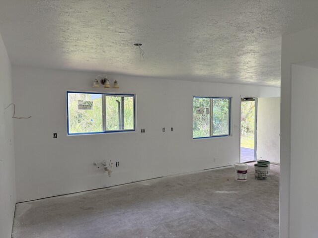 13-3436 Alapai St, Pahoa, HI 96778 - spare room featuring a textured ceiling