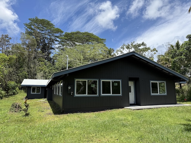 13-3436 Alapai St, Pahoa, HI 96778 - view of front of property with a front lawn