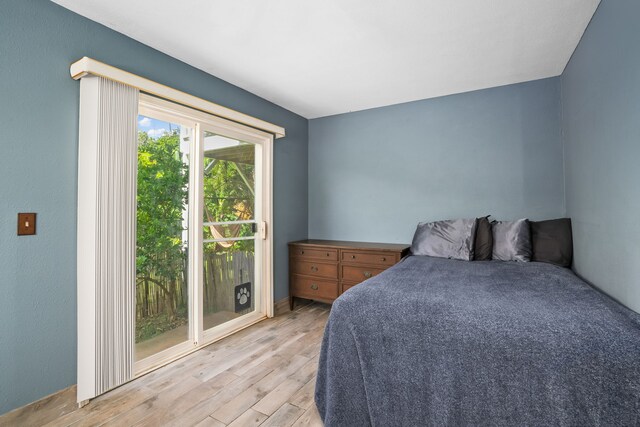 5167 Holomua Pl, Kapaa, HI 96746 - bedroom featuring light wood-type flooring
