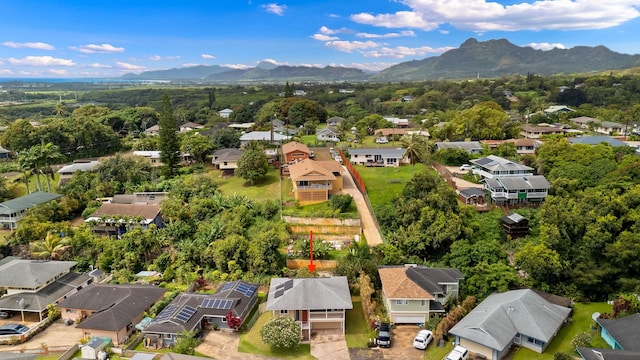 5167 Holomua Pl, Kapaa, HI 96746 - aerial perspective of suburban area featuring a mountainous background