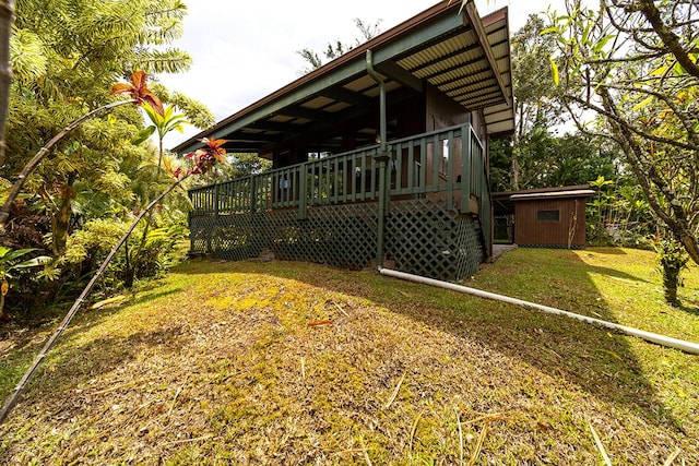 15-1429 22nd Ave, Keaau, HI 96749 - view of side of property featuring a wooden deck and a yard