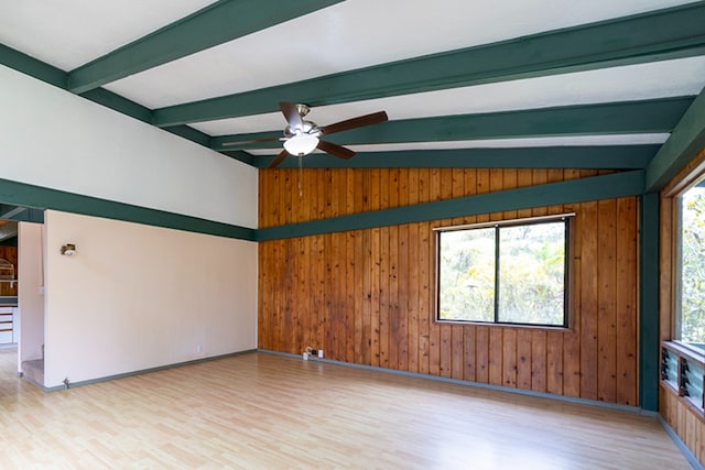 15-1429 22nd Ave, Keaau, HI 96749 - spare room featuring light wood-type flooring, beam ceiling, wood walls, baseboards, and a ceiling fan