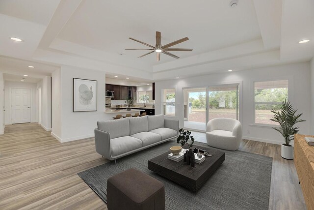 15-2047 32nd Ave, Keaau, HI 96749 - living area featuring a tray ceiling, a ceiling fan, light wood-style flooring, baseboards, and recessed lighting
