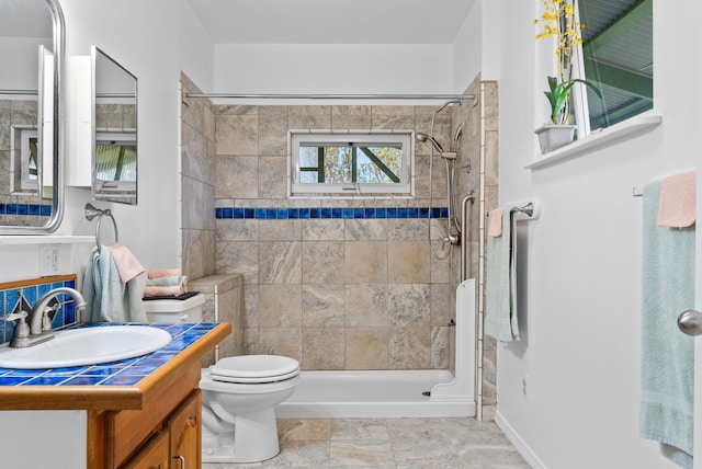 11-2449 Ohialani Rd, Volcano, HI 96785 - full bath featuring vanity, toilet, tiled shower, and baseboards