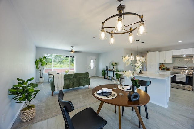 15-1791 4th Ave, Keaau, HI 96749 - dining area featuring a chandelier and baseboards