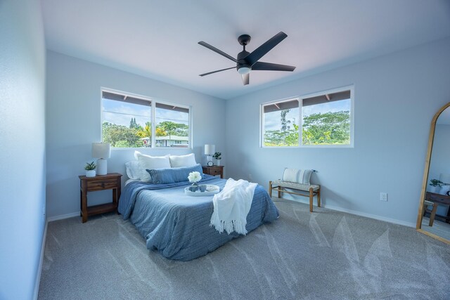 15-1791 4th Ave, Keaau, HI 96749 - carpeted bedroom with baseboards and ceiling fan