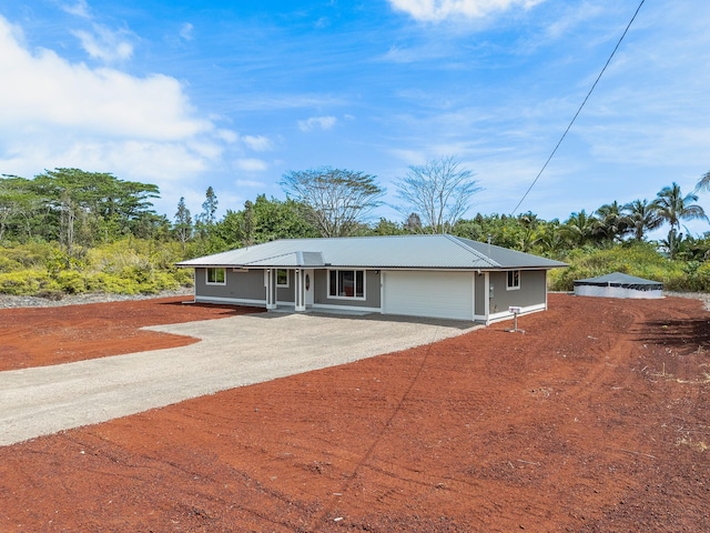 15-1791 4th Ave, Keaau, HI 96749 - single story home featuring driveway, metal roof, and a garage