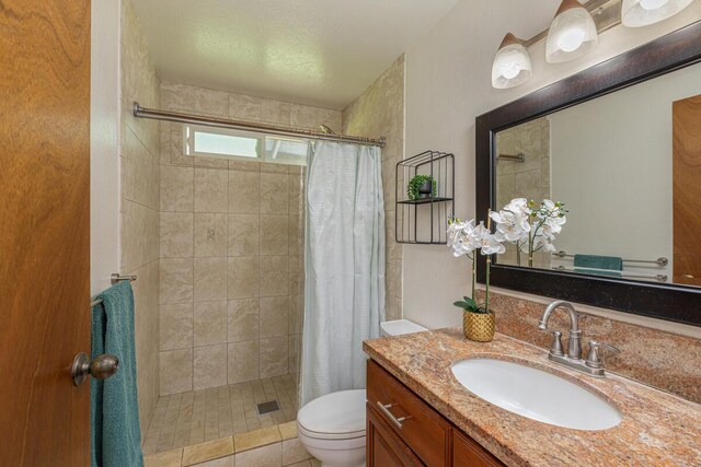 171 Lani Alii Pl, Kapaa, HI 96746 - bathroom with toilet, a tile shower, and vanity