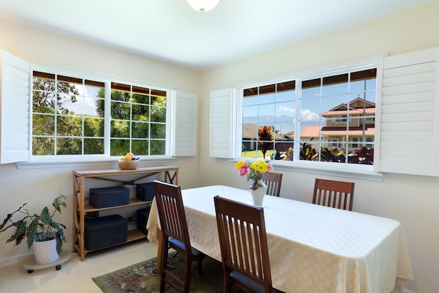 67-1272 Laikealoha St, Kamuela, HI 96743 - carpeted dining area featuring plenty of natural light