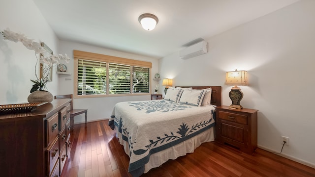 5-6691 Kuhio Hwy, Hanalei, HI 96714 - bedroom with a wall mounted AC, baseboards, and dark wood-style floors