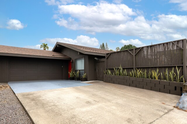 75-5811 Nani Kailua Pl, Kailua-Kona, HI 96740 - view of front of house featuring concrete driveway and a garage