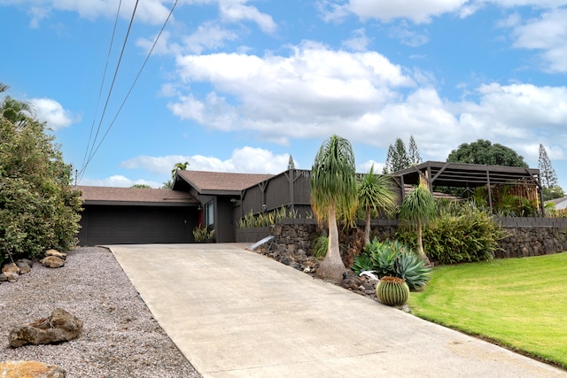 75-5811 Nani Kailua Pl, Kailua-Kona, HI 96740 - view of front of property with an attached garage, driveway, and a front lawn