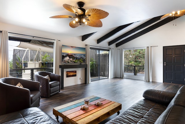 75-5811 Nani Kailua Pl, Kailua-Kona, HI 96740 - living area featuring wood finished floors, a lit fireplace, ceiling fan, and baseboards