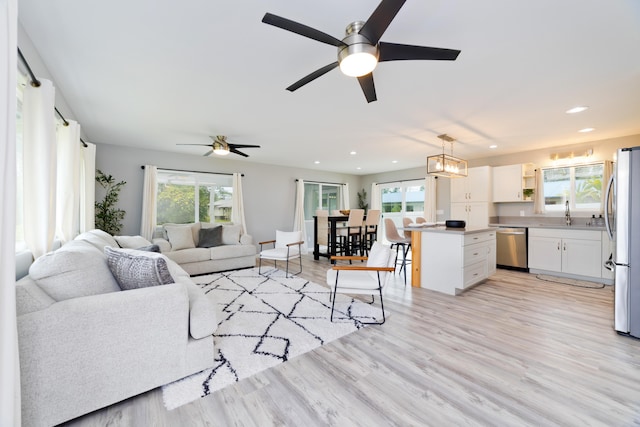 15-2804 Maikoiko St, Pahoa, HI 96778 - living room featuring ceiling fan, recessed lighting, healthy amount of natural light, and light wood finished floors